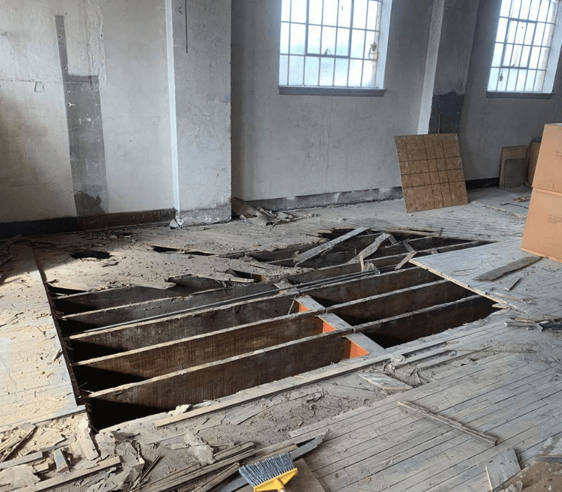 Extensively Damaged Hardwood Floor