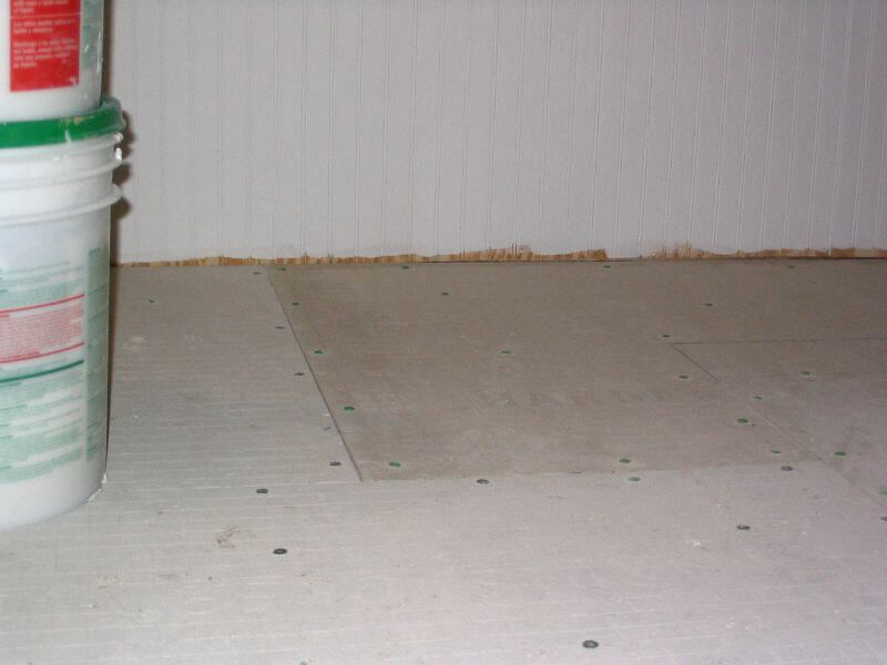 cement backer board, attached to the subfloor with special screws